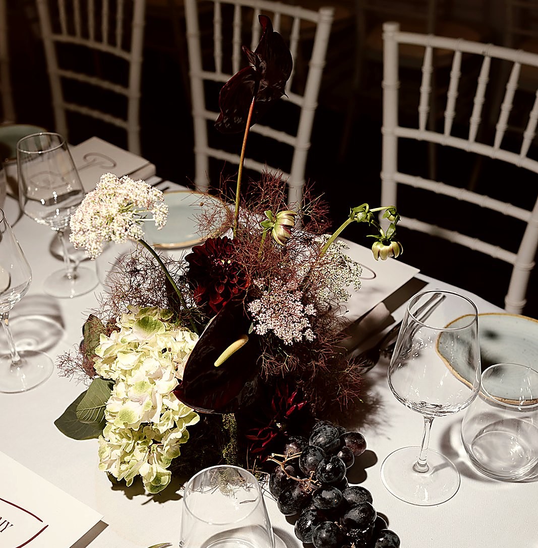Moody floral arrangement at a Sydney wedding reception